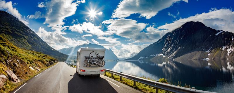 Caravan car travels on the highway.